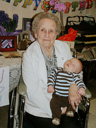 Grandma holding Brooks on her 95th birthday 2012