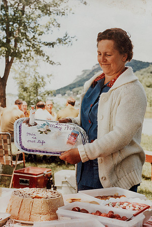 Erna with cake she made for class reunion