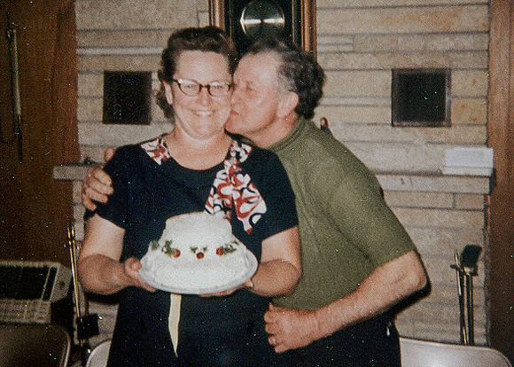 Grandpa kissing Grandma
