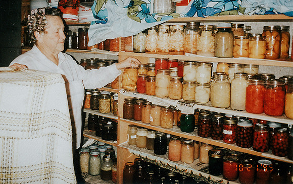 Grandpa took this picture of Grandma with her canned goods