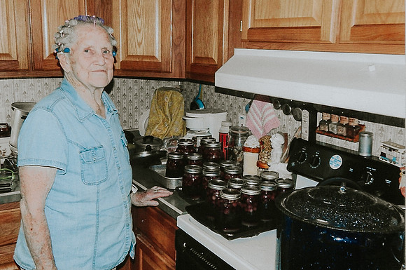 Erna & her canned grape juice at 98 years