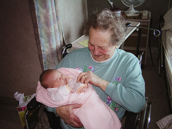 Grandma holding newborn Jade